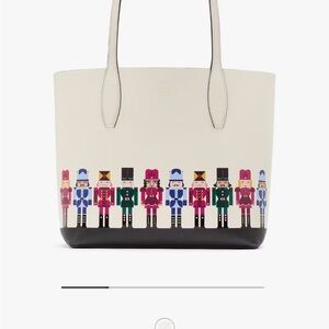 Kate Spade Nutcracker Oh What Fun Cream and Black Tote with detachable wristlet.